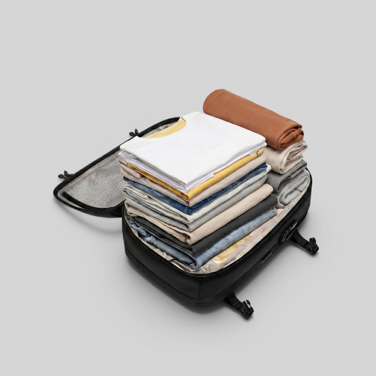 Lavnex ZoraPack Pro backpack filled with folded clothes showing large packing capacity before compression