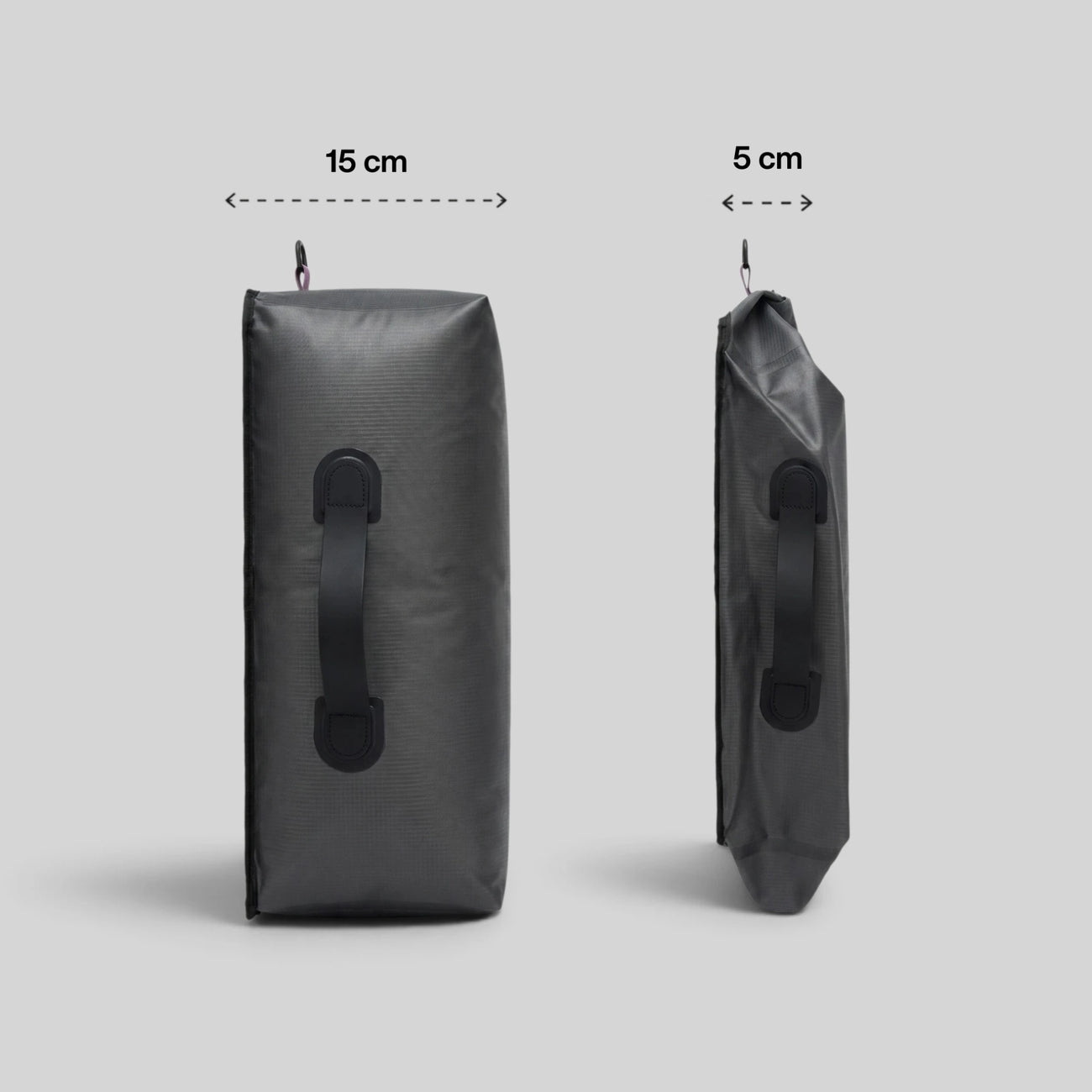Side‑by‑side comparison of Lavnex Rilvac™ Jet Black bag before and after compression showing 15 cm vs 5 cm depth difference on light gray background