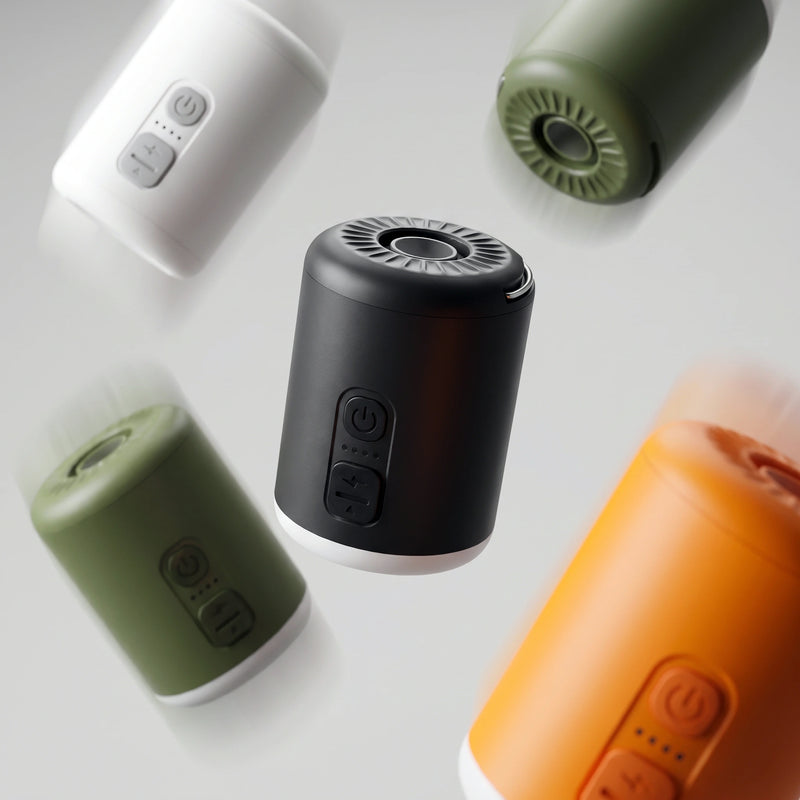Floating display of Lavnex VoxAir Pro™ portable air pumps in Jet Black, Forest Olive, Arctic White, and Solar Amber colors against light background