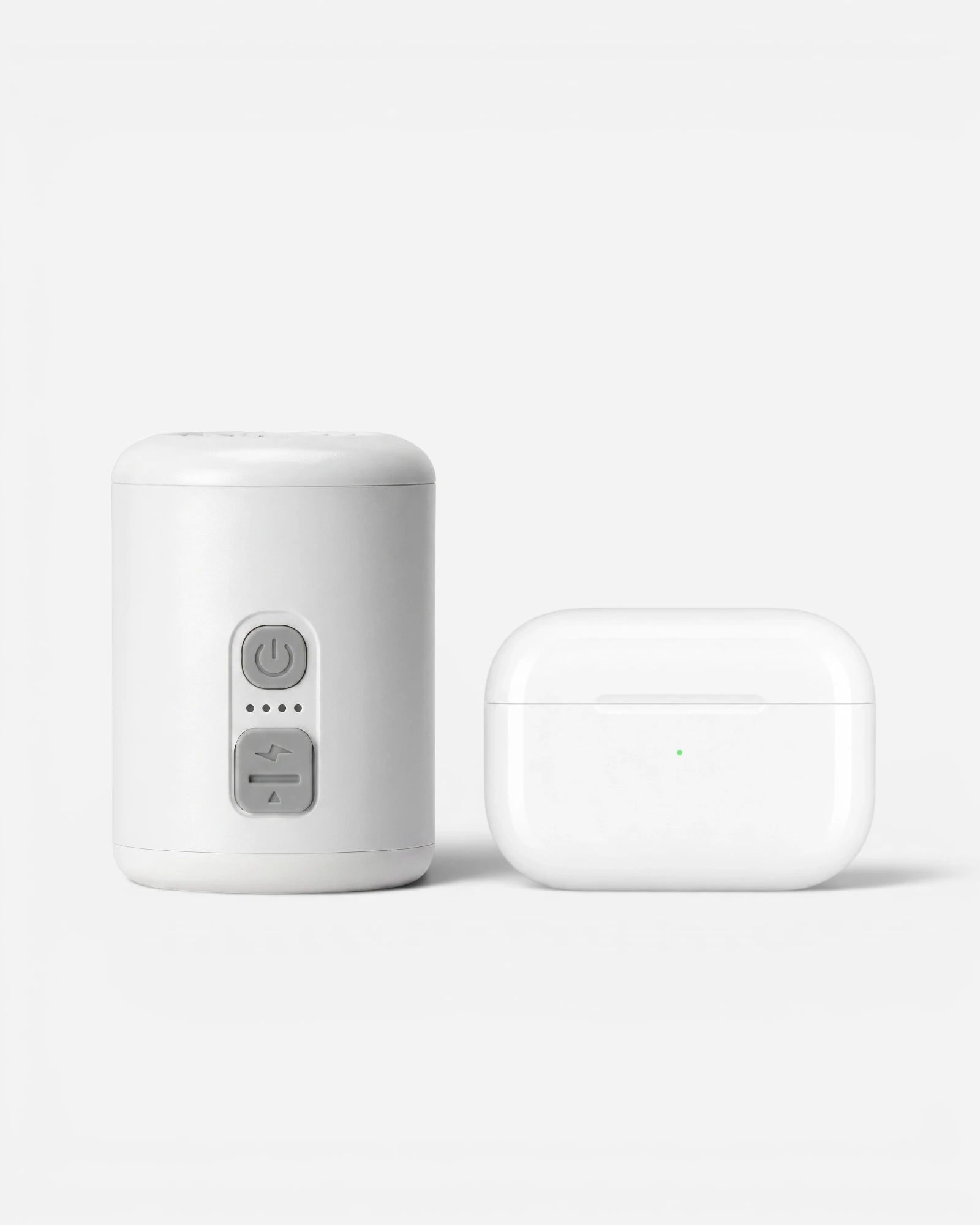Lavnex VoxAir Pro™  portable air pump placed beside white wireless earbuds case showing compact size