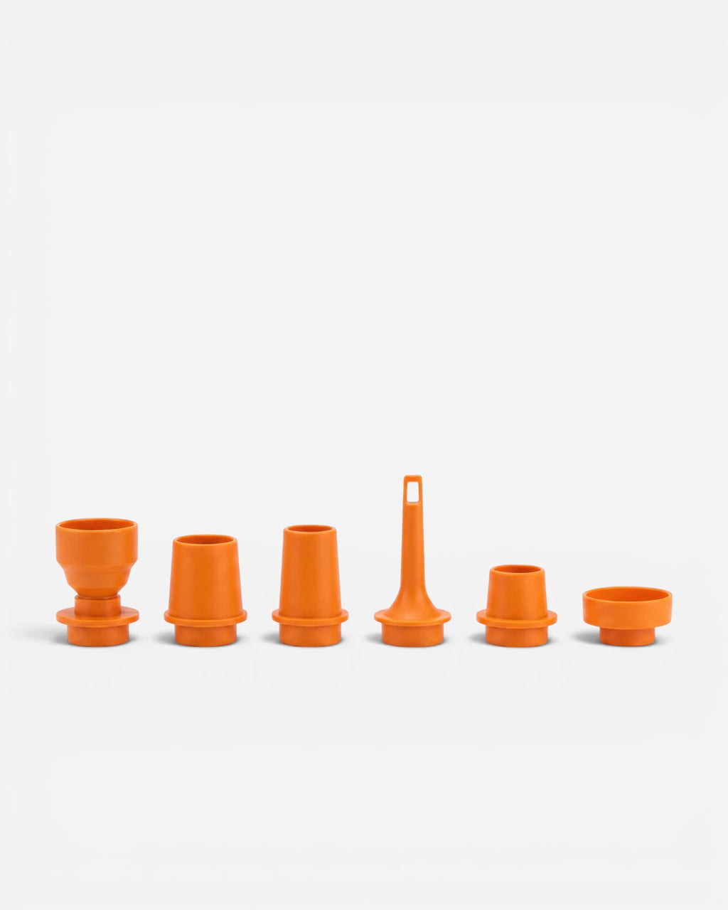 Set of six Solar Amber nozzles for Lavnex VoxAir Pro™ portable air pump arranged in a row on light background