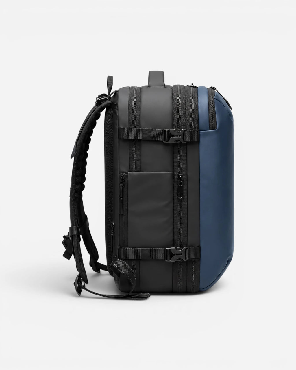 Side view of Lavnex ZoraPack Pro™ Midnight Navy backpack showing waterproof zippers, compression straps, and side pocket design in dual‑tone finish